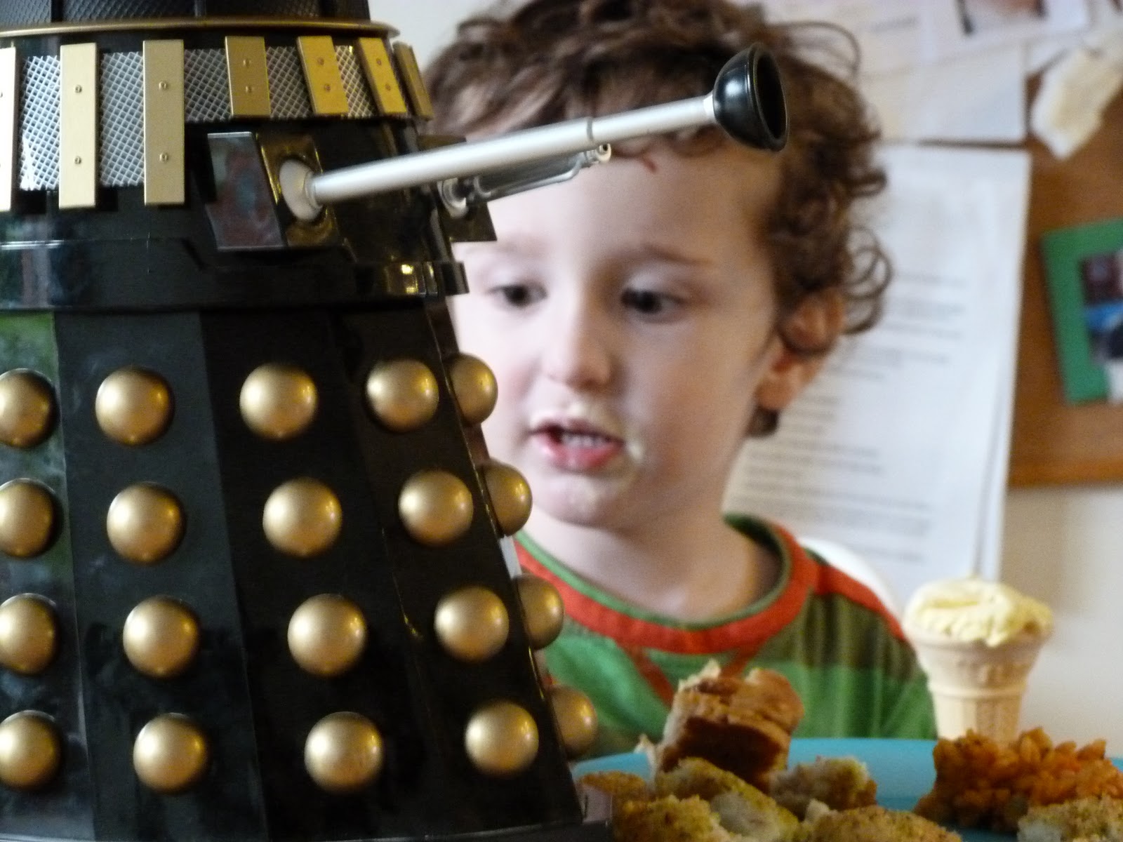 Messy toddler talks to a Dalek