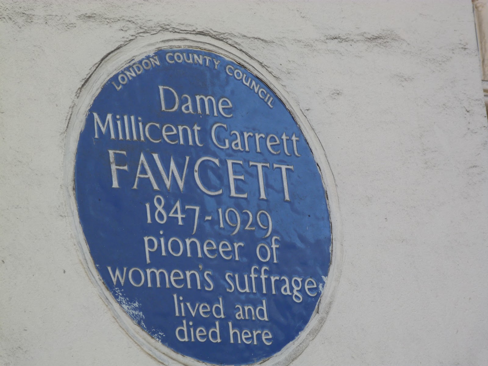 Sign showing where Dame Millicent Garrett suffragette lived.